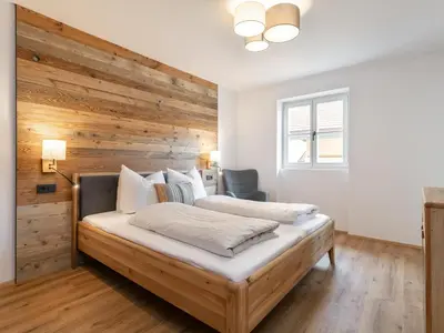 Ein Bett oder Betten in einem Zimmer der Unterkunft Hopfgarten Alpin Living Top 3