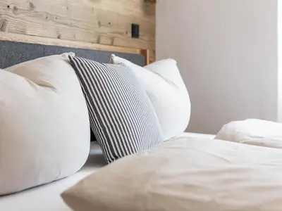 Ein Bett oder Betten in einem Zimmer der Unterkunft Hopfgarten Alpin Living Top 2
