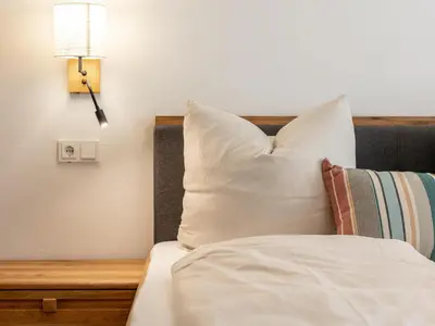 Ein Bett oder Betten in einem Zimmer der Unterkunft Hopfgarten Alpin Living Top 1