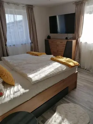 Ein Bett oder Betten in einem Zimmer der Unterkunft Apartment-Seelenblick zentral im Tiroler Unterland
