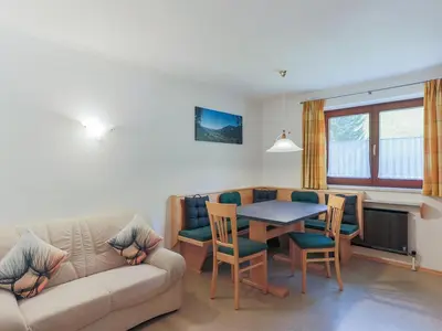 Ein Sitzbereich in der Unterkunft Appartement Riedmann