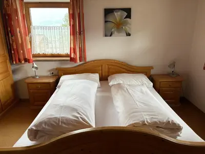 Ein Bett oder Betten in einem Zimmer der Unterkunft Ferienhof Kohler