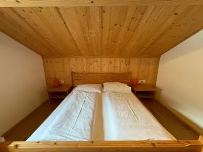 Ein Bett oder Betten in einem Zimmer der Unterkunft Ferienhof Kohler