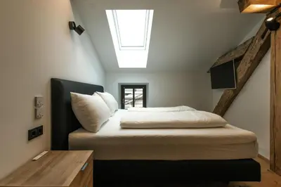 Ein Bett oder Betten in einem Zimmer der Unterkunft Appartements Gasthof Traube Top 5
