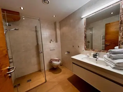 Ein Badezimmer in der Unterkunft Berggasthof Schatzbergalm