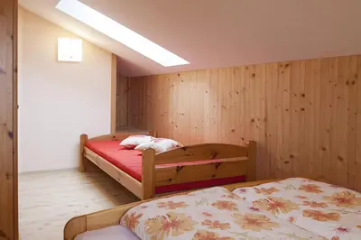 Ein Bett oder Betten in einem Zimmer der Unterkunft Biobauernhof Schuster