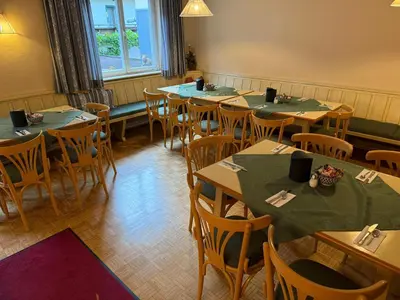 Ein Restaurant oder anderes Speiselokal in der Unterkunft Pension Rainer
