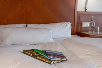 Ein Bett oder Betten in einem Zimmer der Unterkunft Alpenhotel Ramsauerhof