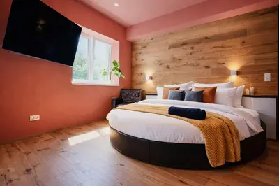 Ein Bett oder Betten in einem Zimmer der Unterkunft COLORGRAM Loft - by AlpenLuxus Collection