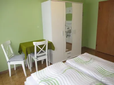 Ein Bett oder Betten in einem Zimmer der Unterkunft Haus Birgit