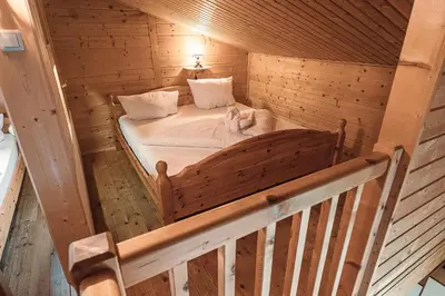 Ein Bett oder Betten in einem Zimmer der Unterkunft Almdorf Tirol Wildschönau