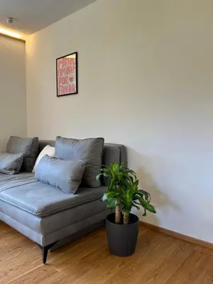 Ein Sitzbereich in der Unterkunft AlpineHome Apartments Walchsee