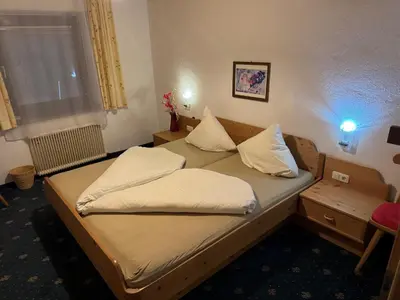Ein Bett oder Betten in einem Zimmer der Unterkunft Schönmoosalm