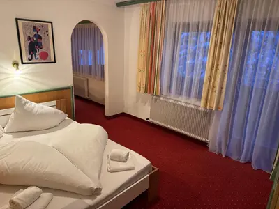 Ein Bett oder Betten in einem Zimmer der Unterkunft Schönmoosalm