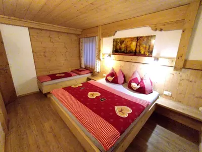 Ein Bett oder Betten in einem Zimmer der Unterkunft Appartements Wallner