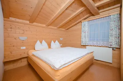 Ein Bett oder Betten in einem Zimmer der Unterkunft Appartements Wallner