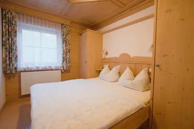 Ein Bett oder Betten in einem Zimmer der Unterkunft Appartements Wallner