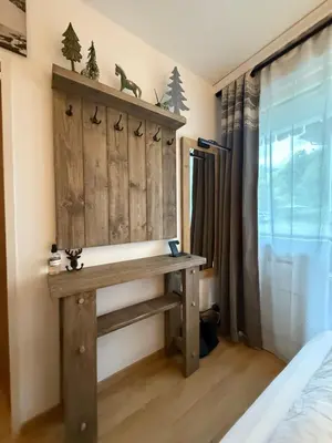 Ein Bett oder Betten in einem Zimmer der Unterkunft Charming apartment Berggeweih Lodge at Zwölferkogel in Hinterglemm