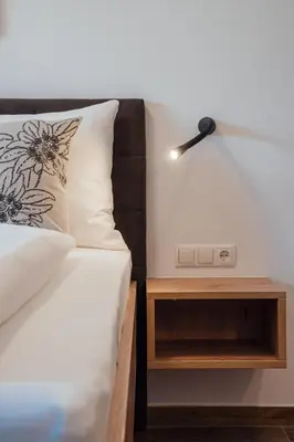 Ein Bett oder Betten in einem Zimmer der Unterkunft Der Kehlbachwirt by Monteviva