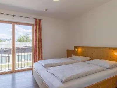 Ein Bett oder Betten in einem Zimmer der Unterkunft Next to the ski lift A 4