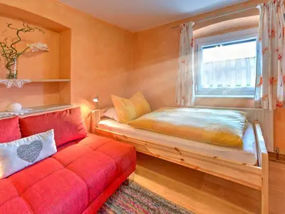 Ein Bett oder Betten in einem Zimmer der Unterkunft Innradweg