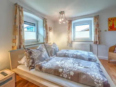 Ein Bett oder Betten in einem Zimmer der Unterkunft Innradweg