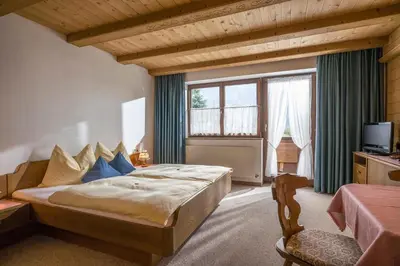 Ein Bett oder Betten in einem Zimmer der Unterkunft Appartementhaus Ederegger