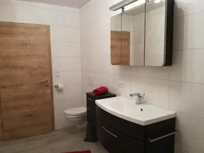Ein Badezimmer in der Unterkunft Haus Angela