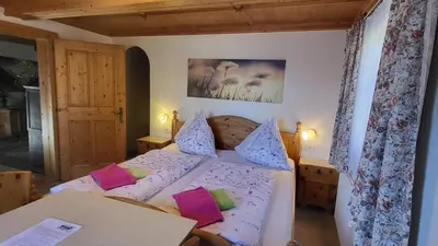 Ein Bett oder Betten in einem Zimmer der Unterkunft Stefflhof Mittersill