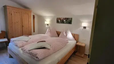 Ein Bett oder Betten in einem Zimmer der Unterkunft Stefflhof Mittersill
