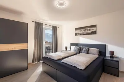 Ein Bett oder Betten in einem Zimmer der Unterkunft Apart Bergverliebt