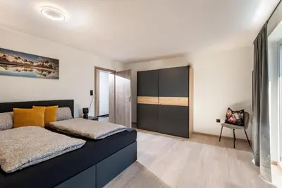 Ein Bett oder Betten in einem Zimmer der Unterkunft Apart Bergverliebt