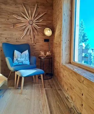 Ein Sitzbereich in der Unterkunft Chalet Vierlauchen