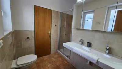 Ein Badezimmer in der Unterkunft Haus Schiwelt