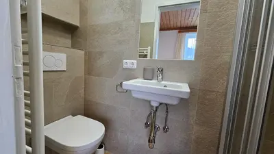 Ein Badezimmer in der Unterkunft Haus Schiwelt