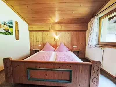 Ein Bett oder Betten in einem Zimmer der Unterkunft Apartment Trojer-1 by Interhome