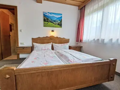 Ein Bett oder Betten in einem Zimmer der Unterkunft Apartment Trojer-2 by Interhome