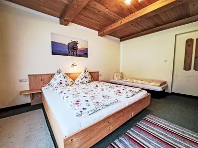 Ein Bett oder Betten in einem Zimmer der Unterkunft Apartment Trojer-2 by Interhome