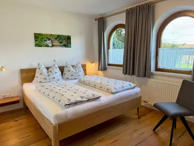 Ein Bett oder Betten in einem Zimmer der Unterkunft Ferienwohnung Seethaler - Gartenblick