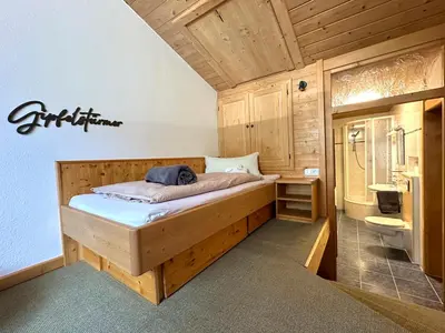 Ein Bett oder Betten in einem Zimmer der Unterkunft Ferienwohnung Anni