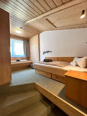 Ein Bett oder Betten in einem Zimmer der Unterkunft Ferienwohnung Anni