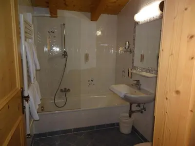 Ein Badezimmer in der Unterkunft Alpenhotel Landhaus Küchl