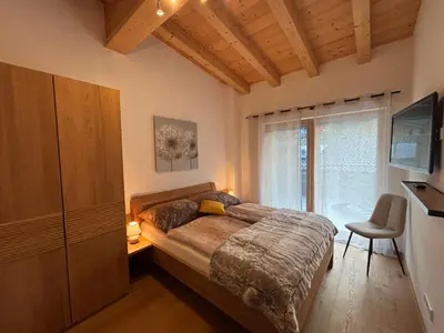 Ein Bett oder Betten in einem Zimmer der Unterkunft Apartment ZillerSoul