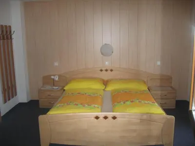 Ein Bett oder Betten in einem Zimmer der Unterkunft Haus Grünanger - Wildschönau Premium Card im Sommer inclusive !