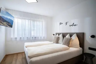 Ein Bett oder Betten in einem Zimmer der Unterkunft Apart Elfi