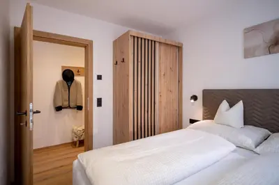 Ein Bett oder Betten in einem Zimmer der Unterkunft Apart Elfi