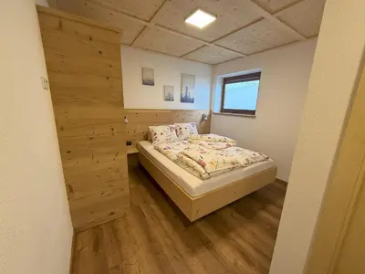 Ein Bett oder Betten in einem Zimmer der Unterkunft Ferienhaus Innergruben