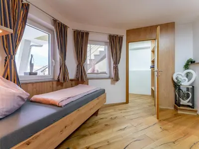 Ein Bett oder Betten in einem Zimmer der Unterkunft 11er Kogel