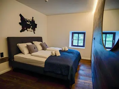 Ein Bett oder Betten in einem Zimmer der Unterkunft Tiroler Bergzeit