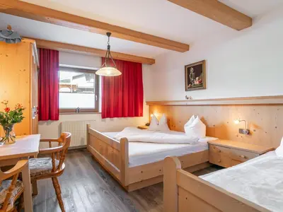 Ein Bett oder Betten in einem Zimmer der Unterkunft Landhaus Marchfeld Top 4